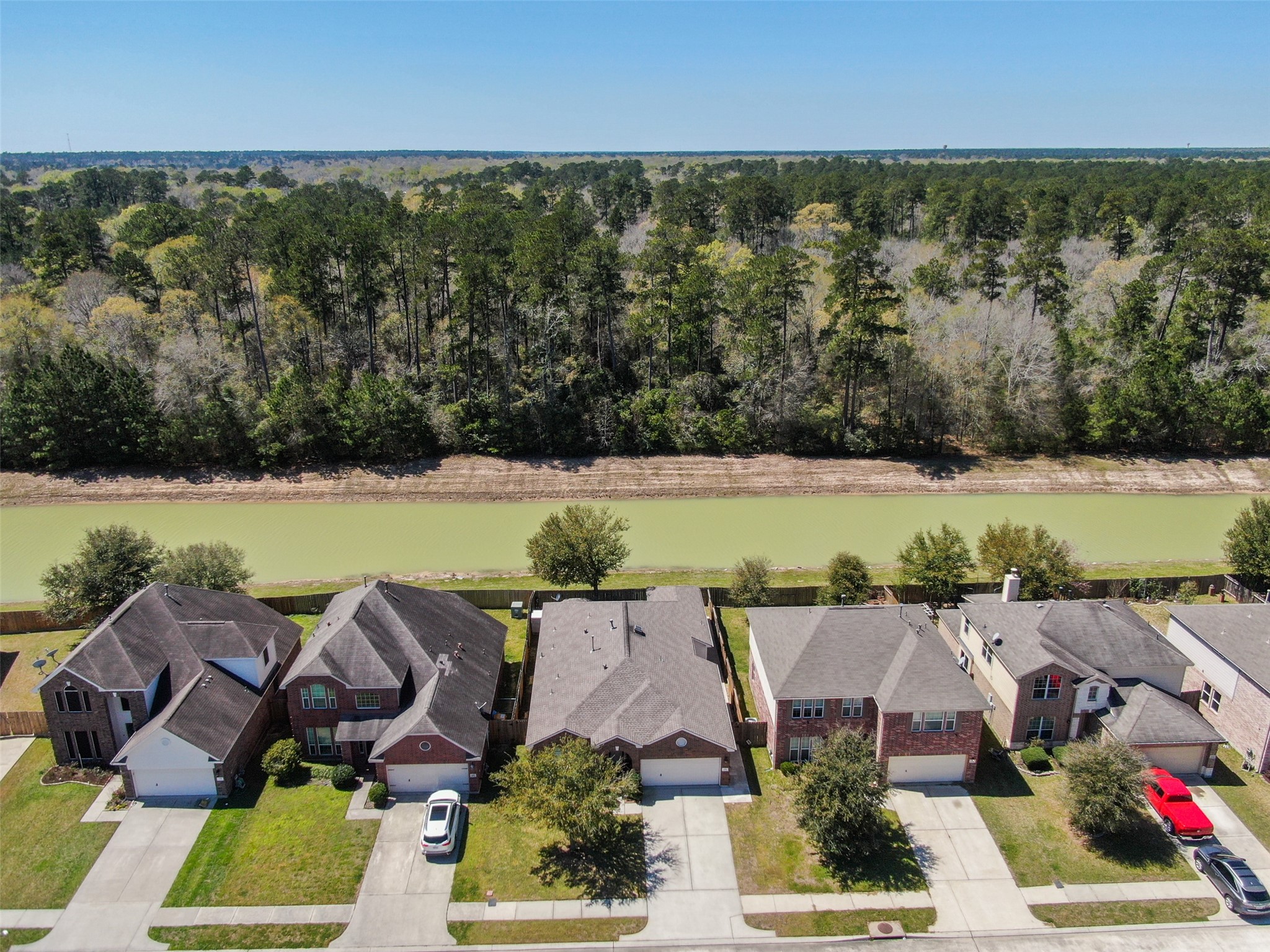 438 Oak Gate Drive Conroe, TX 77304 - Photo 14 of 18 an aerial view of multiple house