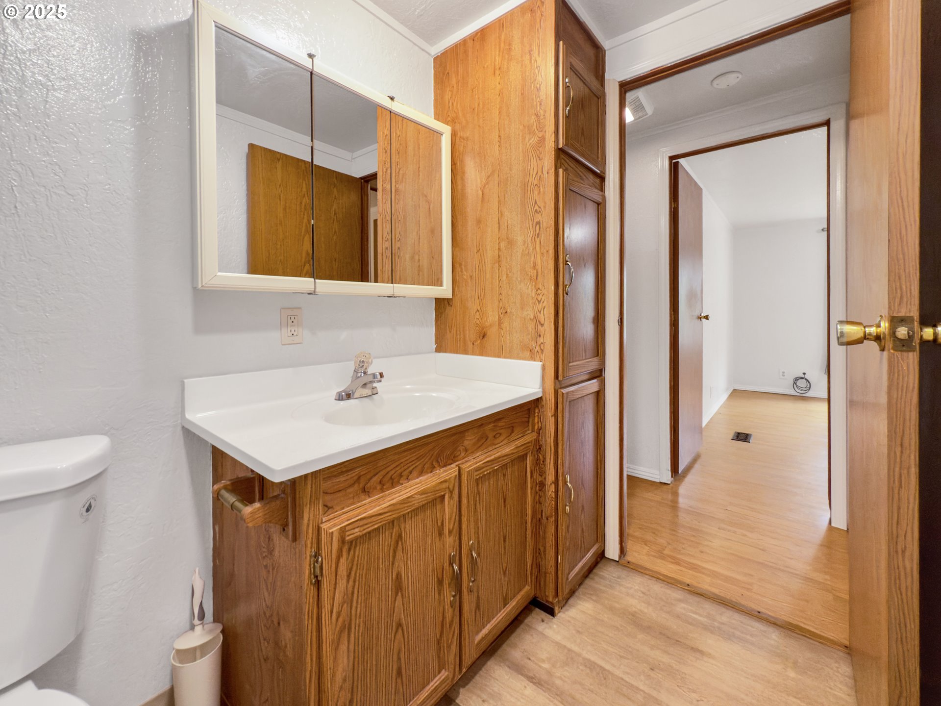 98041 Hallway Road, Unit 26 Brookings, OR 97415 - Photo 31 of 46 a bathroom with a sink a toilet and shower