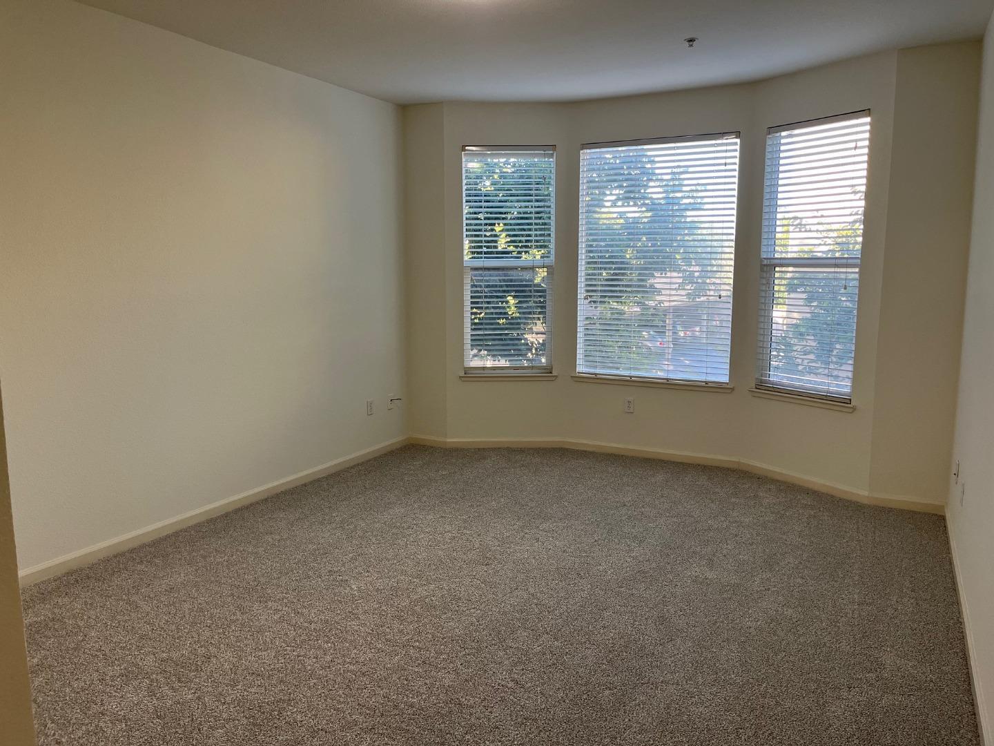 213 Pacifica Boulevard, Unit 202 Watsonville, CA 95076 - Photo 11 of 19 an empty room with a window