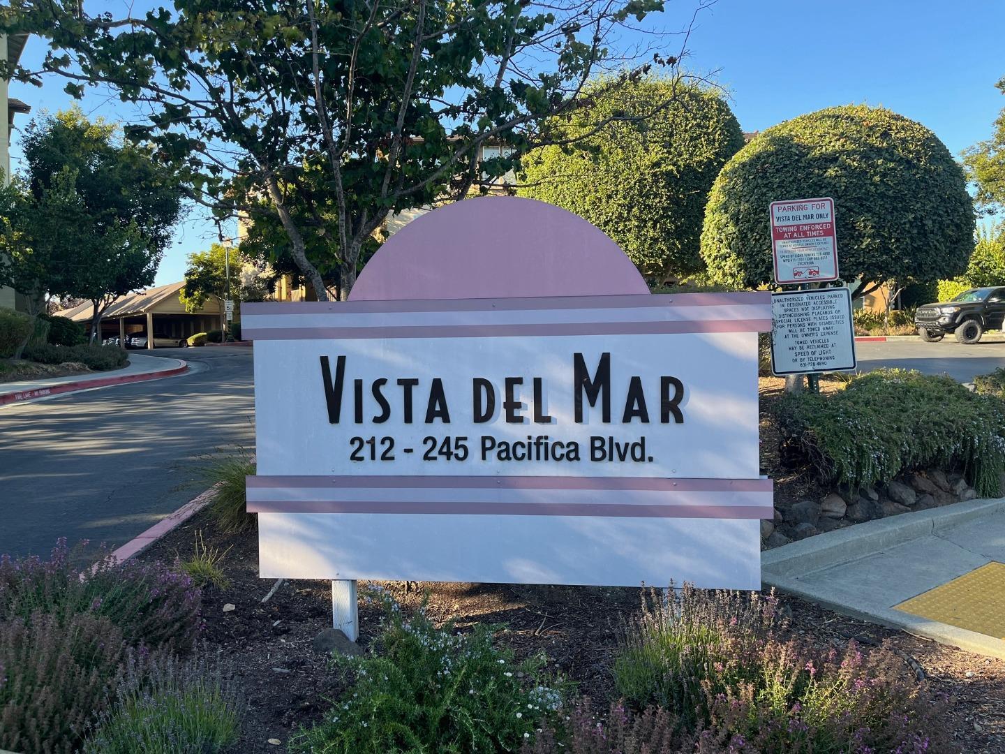 213 Pacifica Boulevard, Unit 202 Watsonville, CA 95076 - Photo 18 of 19 a front view of a house with garden