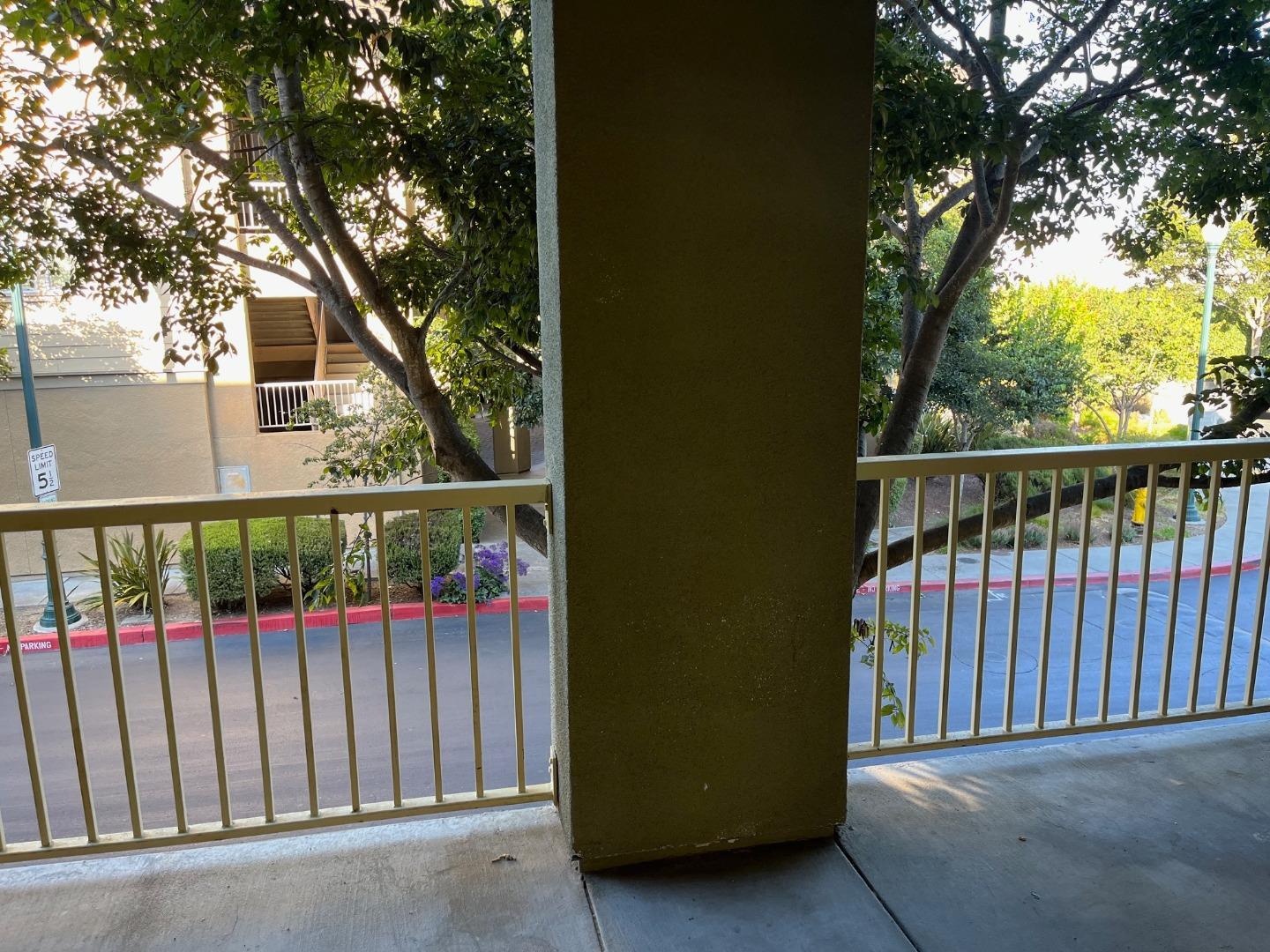 213 Pacifica Boulevard, Unit 202 Watsonville, CA 95076 - Photo 5 of 19 a view of a wrought iron fences