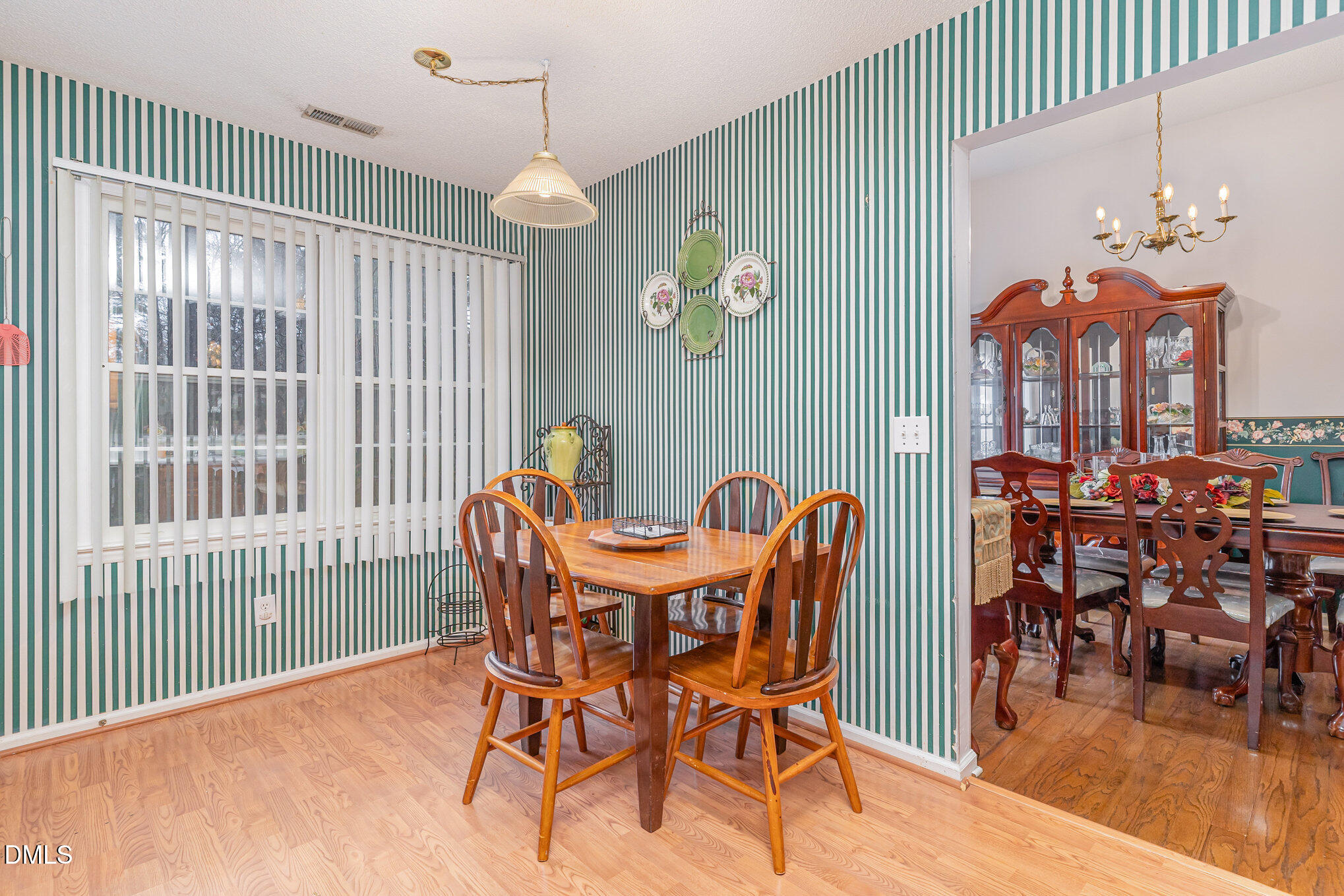 1009 Willow Ridge Drive Knightdale, NC 27545 - Photo 15 of 28 a view of a dining room with furniture window and outside view