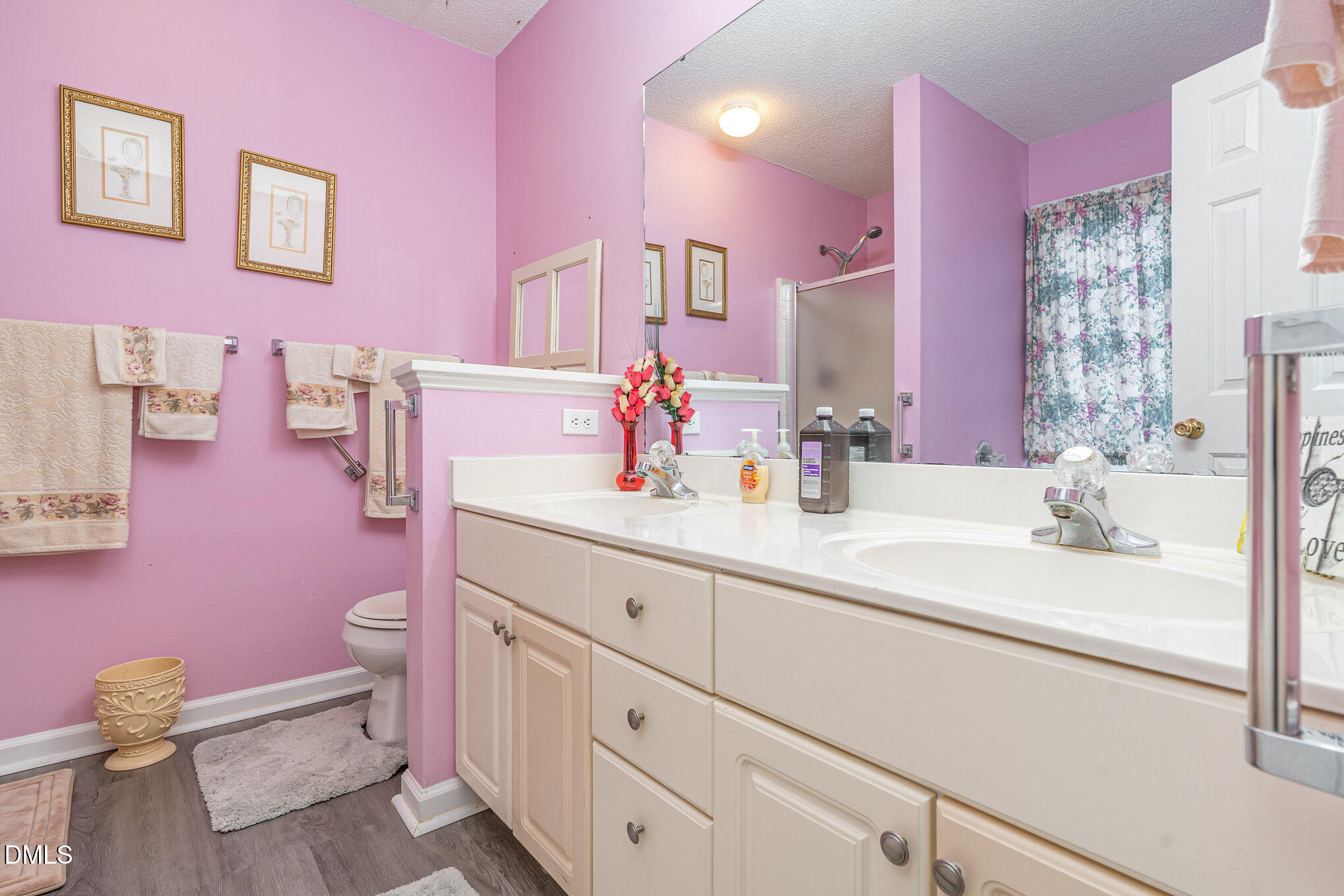 1009 Willow Ridge Drive Knightdale, NC 27545 - Photo 19 of 28 a bathroom with a sink vanity tub and toilet