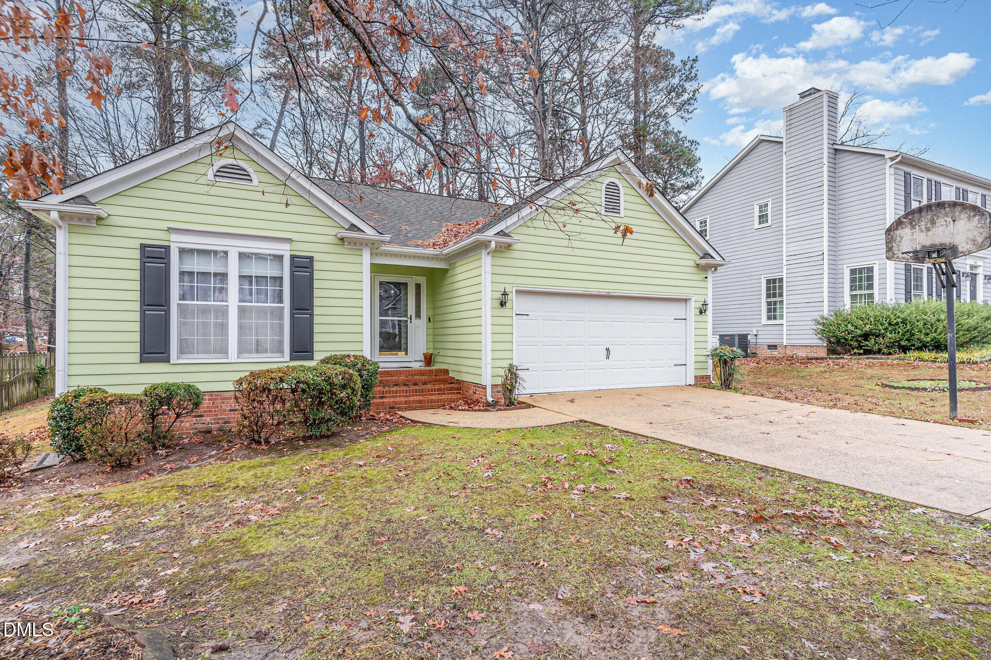 1009 Willow Ridge Drive Knightdale, NC 27545 - Photo 3 of 28 a front view of a house with a yard and garage