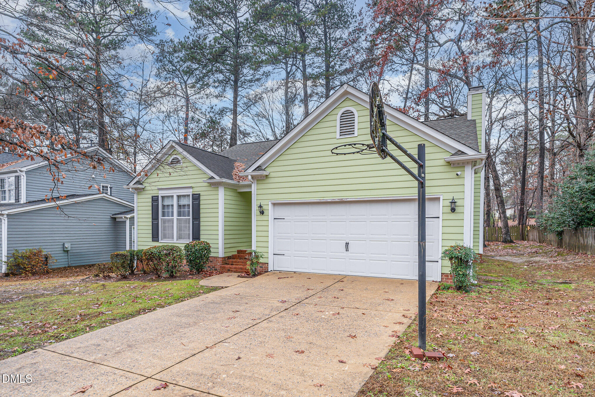 1009 Willow Ridge Drive Knightdale, NC 27545 - Photo 4 of 28 a front view of a house with a yard and garage
