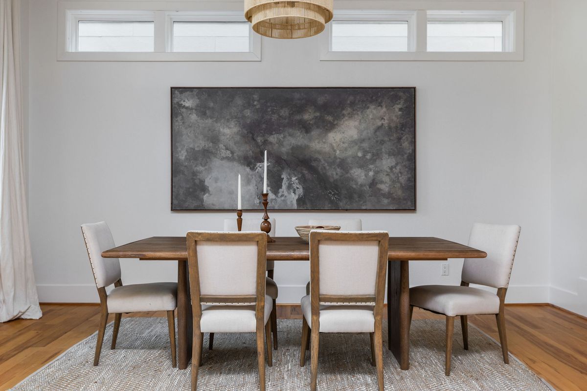 2308 West 9th Street, Unit B Austin, TX 78703 - Photo 12 of 40 a dining room with furniture and wooden floor