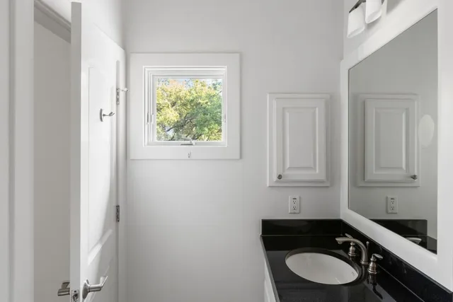 a bathroom with a sink and a toilet