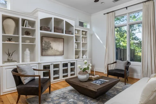 a living room with furniture and a window