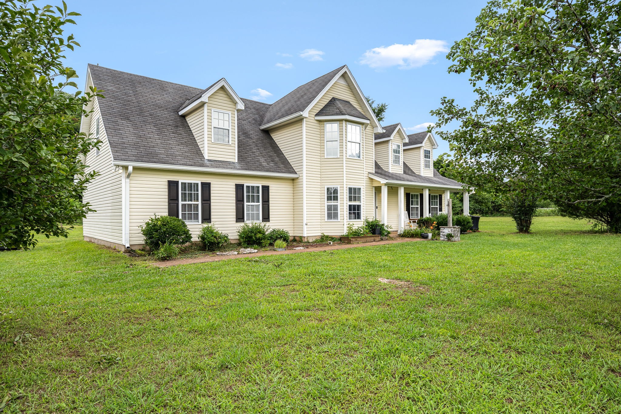 4842 Lunns Store Road Chapel Hill, TN 37034 - Photo 3 of 52 a front view of a house with a yard