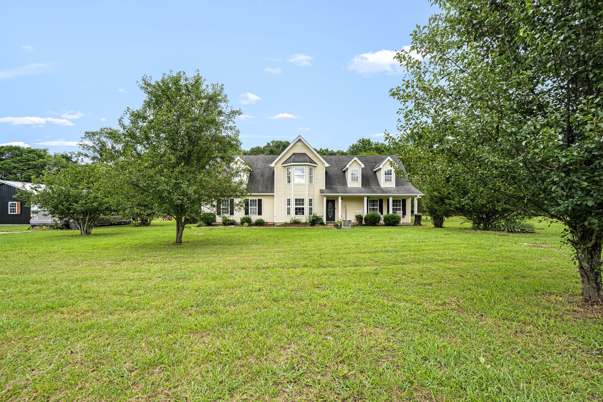 4842 Lunns Store Road Chapel Hill, TN 37034 - Photo 4 of 52 a front view of a house with a big yard