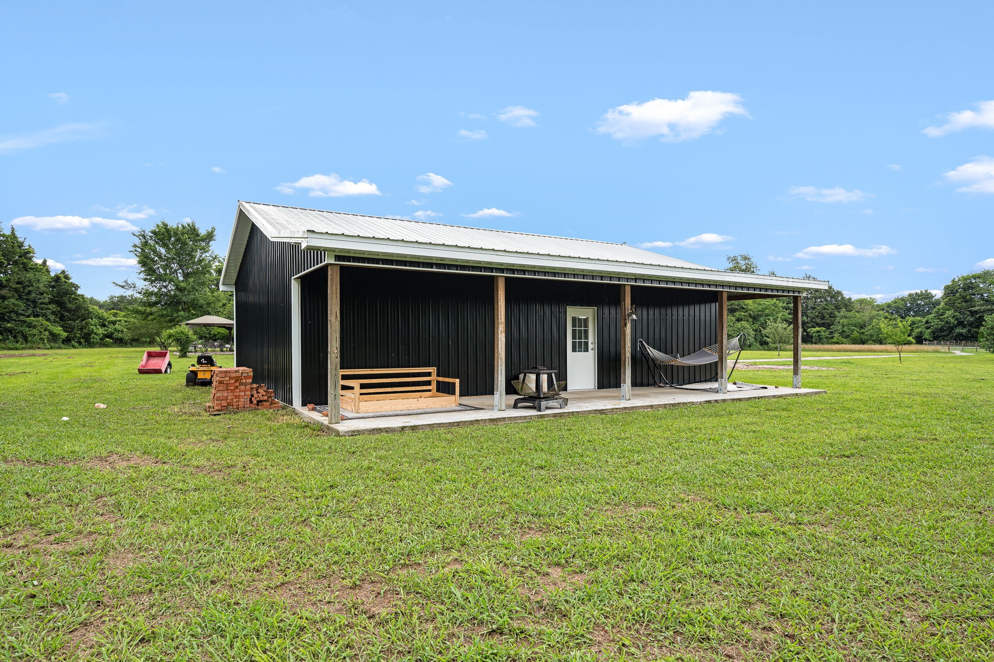4842 Lunns Store Road Chapel Hill, TN 37034 - Photo 50 of 52 a view of a house with backyard porch and garden