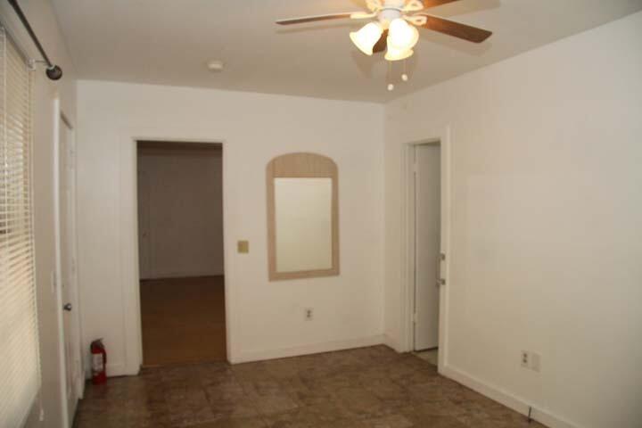 3738 Eagle Avenue Key West, FL 33040 - Photo 15 of 37 wooden floor in an empty room with a window