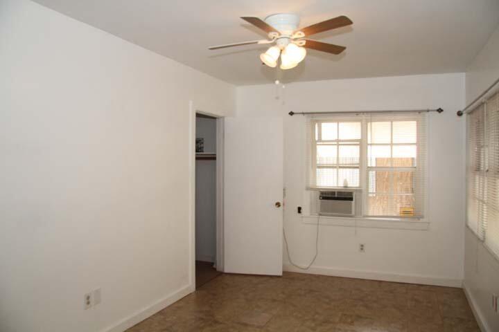 3738 Eagle Avenue Key West, FL 33040 - Photo 19 of 37 an empty room with a window and a ceiling fan