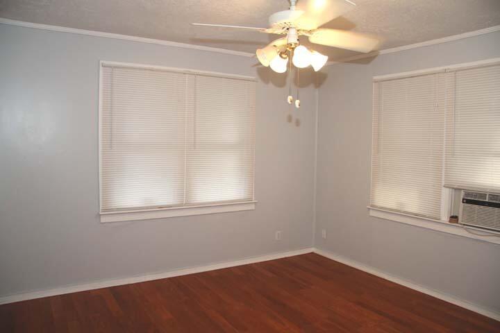 3738 Eagle Avenue Key West, FL 33040 - Photo 33 of 37 a view of an empty room with wooden floor and a window