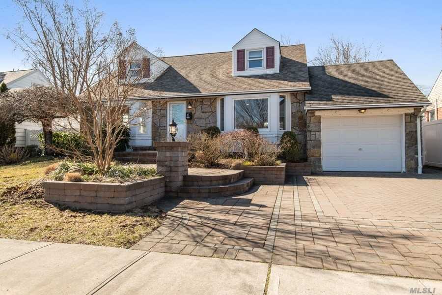 17 Leonard Road Syosset, NY 11791 - Photo 1 of 1 a front view of a house