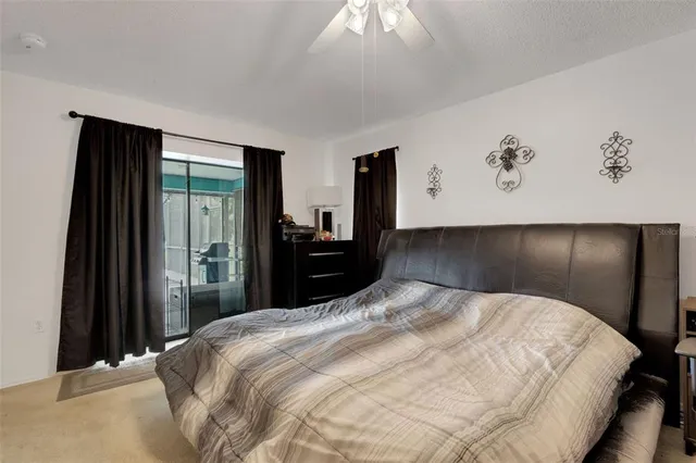 a bathroom with a double vanity sink a mirror and a bathtub