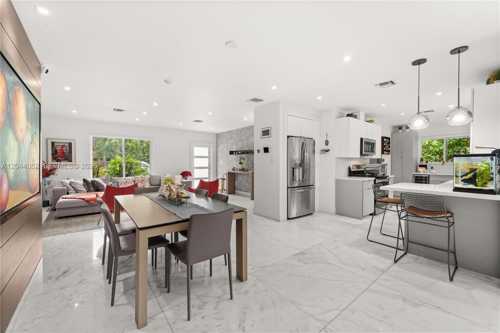 721 Bird Road Coral Gables, FL 33146 - Photo 6 of 24 a view of a dining area with furniture