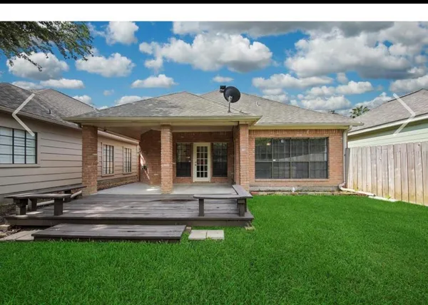 a view of a house with a garden
