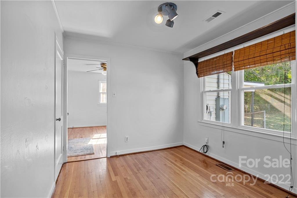 3408 Anson Street, Unit E3 Charlotte, NC 28209 - Photo 14 of 26 an empty room with window
