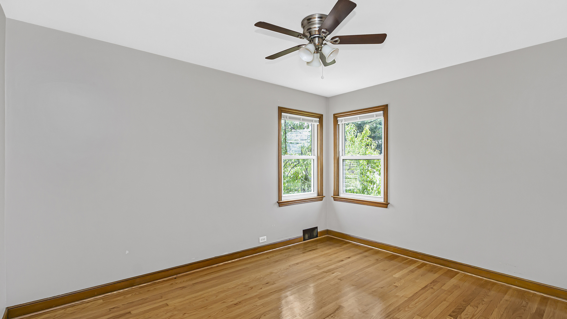 2322 South 7th Avenue North Riverside, IL 60546 - Photo 12 of 21 an empty room with a window and a fan