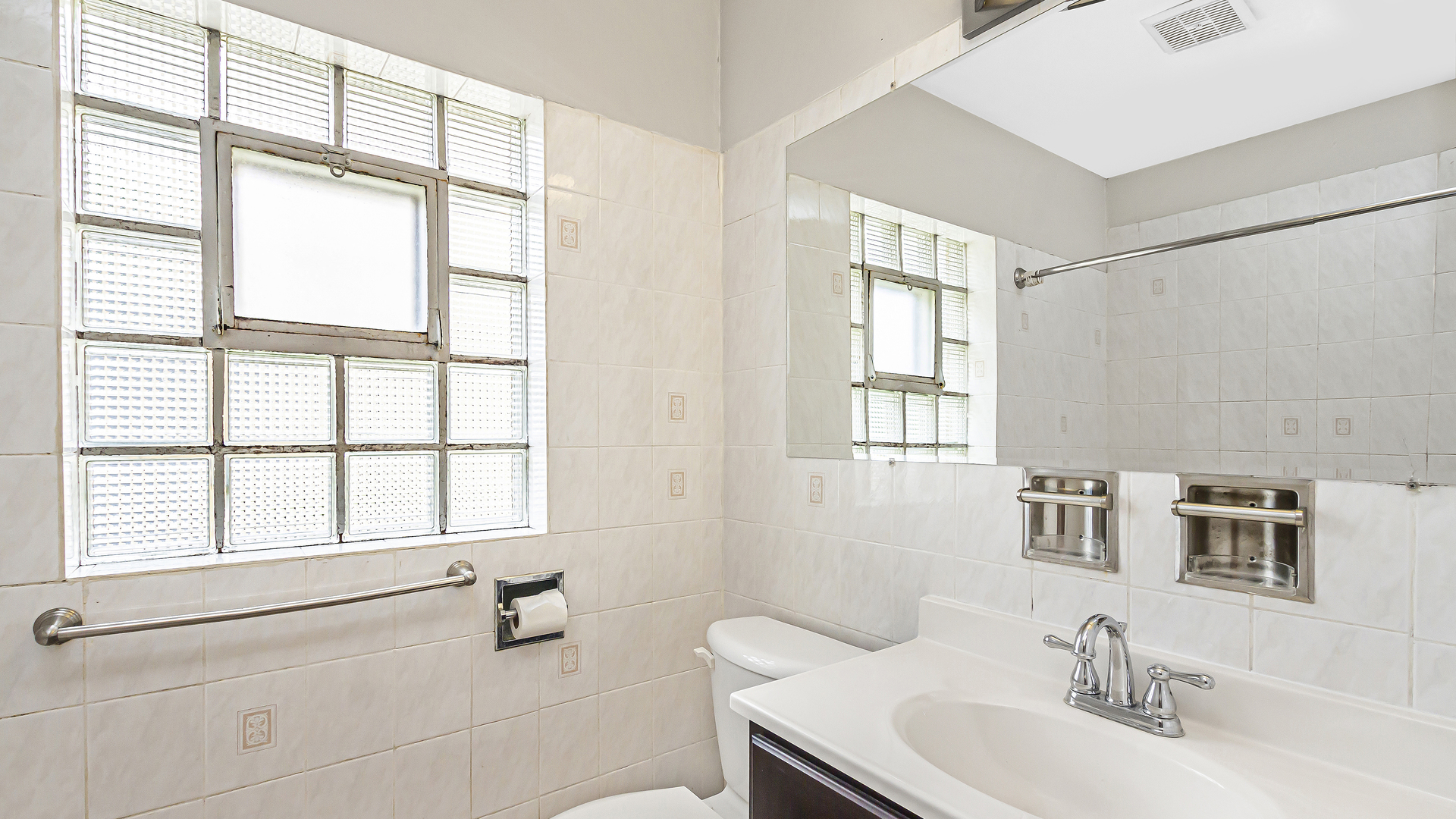 2322 South 7th Avenue North Riverside, IL 60546 - Photo 14 of 21 a bathroom with a sink and a large mirror