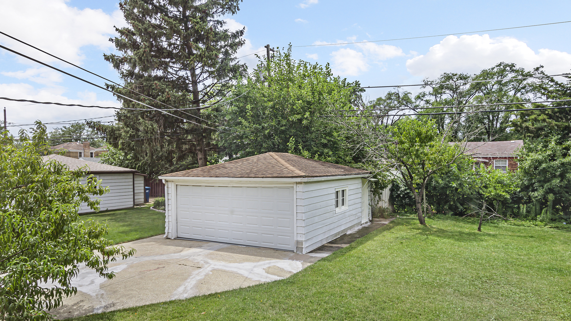 2322 South 7th Avenue North Riverside, IL 60546 - Photo 3 of 21 a aerial view of a white house with a yard and plants