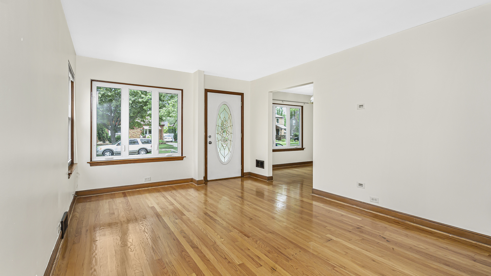 2322 South 7th Avenue North Riverside, IL 60546 - Photo 5 of 21 an empty room with wooden floor and windows