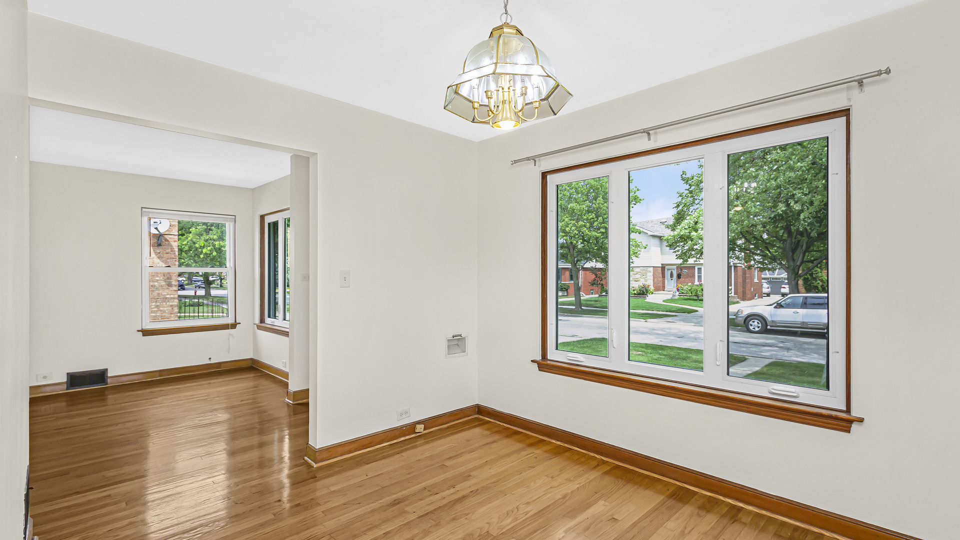 2322 South 7th Avenue North Riverside, IL 60546 - Photo 7 of 21 a view of empty room with wooden floor and fan