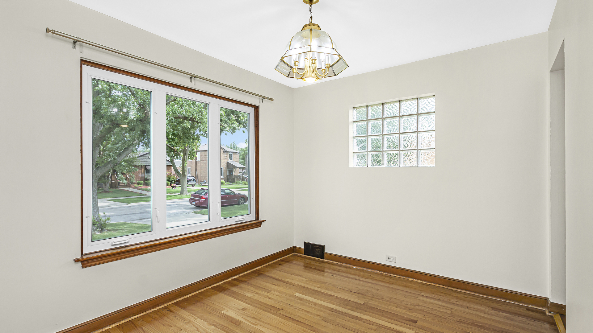 2322 South 7th Avenue North Riverside, IL 60546 - Photo 8 of 21 an empty room with wooden floor and windows