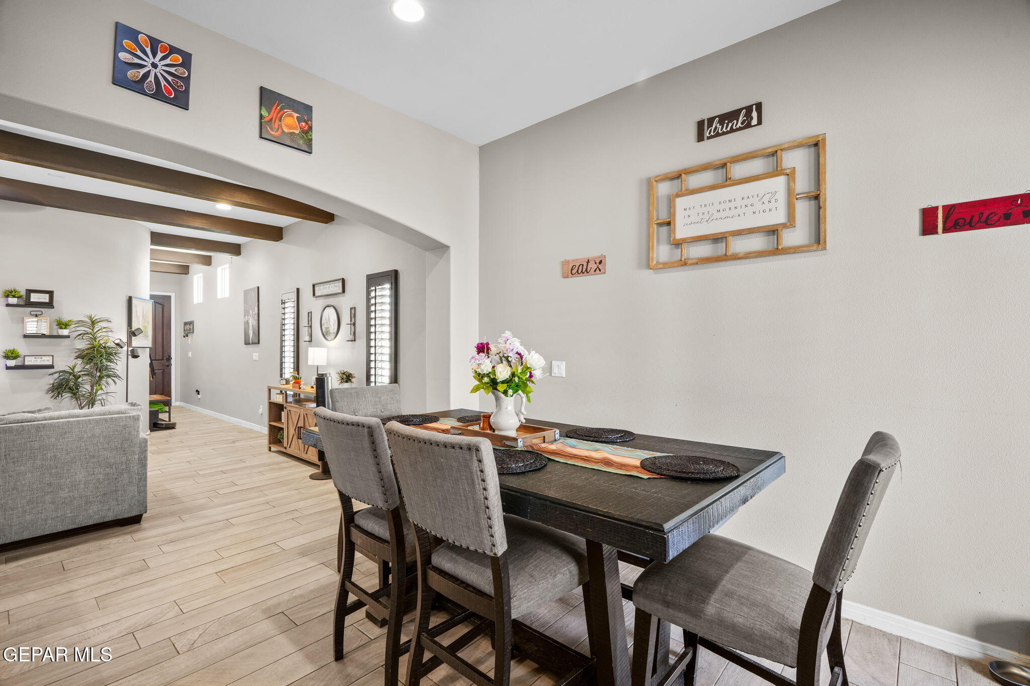 13737 Garforth Avenue El Paso, TX 79928 - Photo 12 of 34 a view of a dining room with furniture and wooden floor