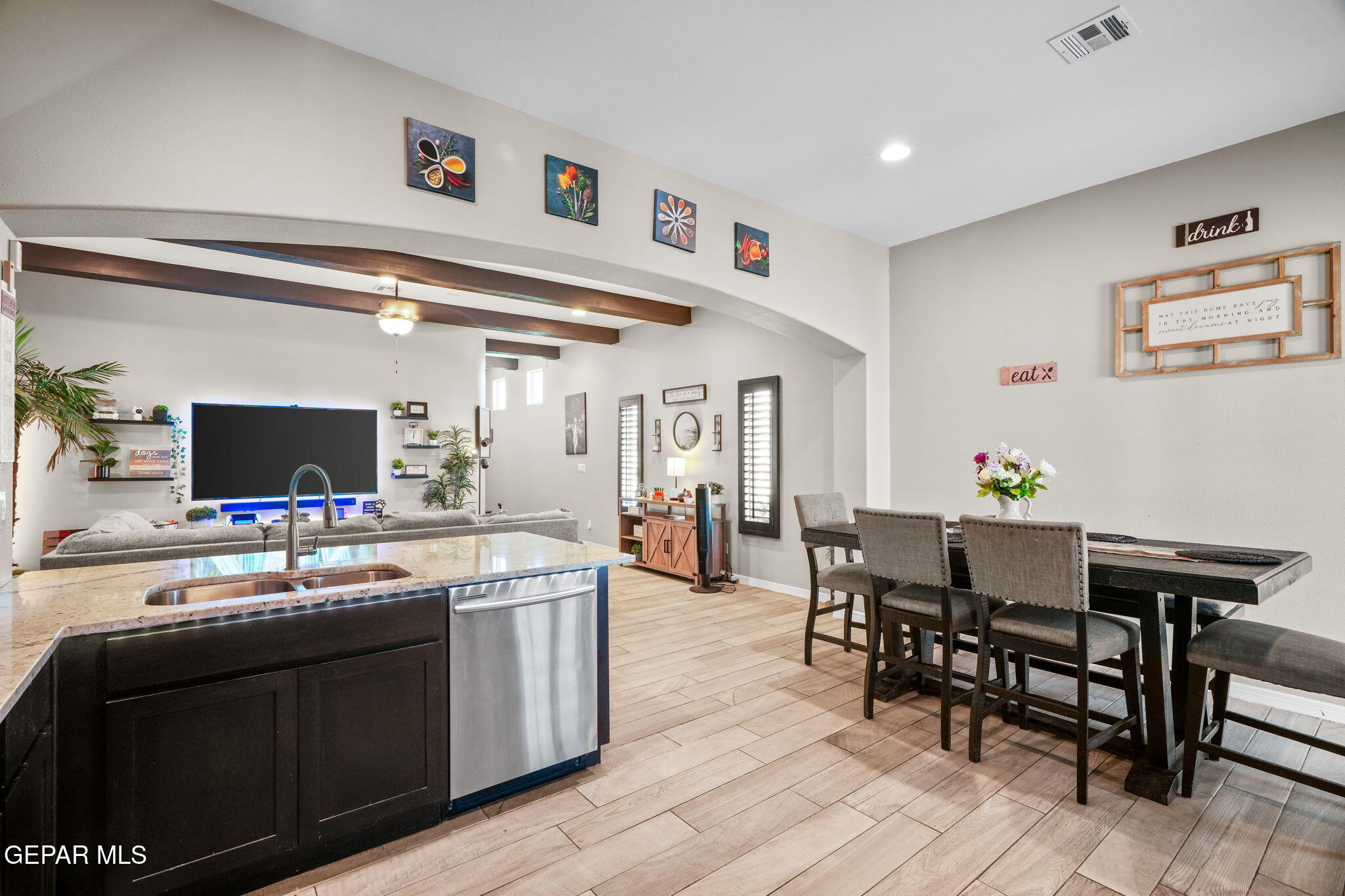 13737 Garforth Avenue El Paso, TX 79928 - Photo 14 of 34 a view of a dining room with furniture and wooden floor