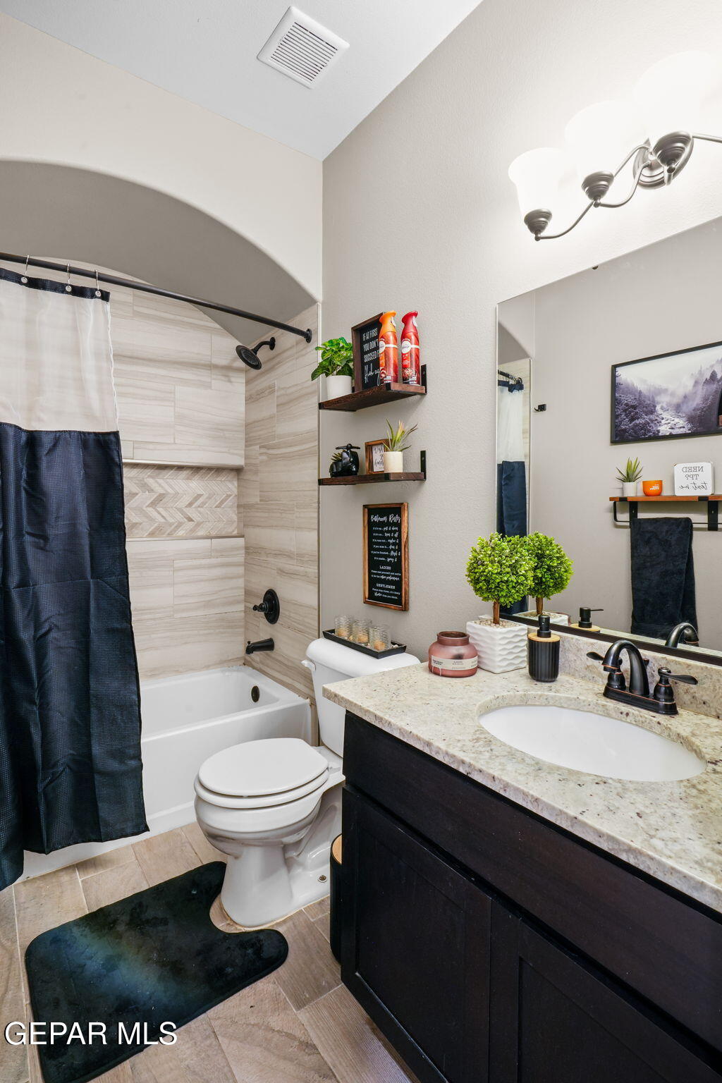 13737 Garforth Avenue El Paso, TX 79928 - Photo 20 of 34 a bathroom with a sink a toilet and shower
