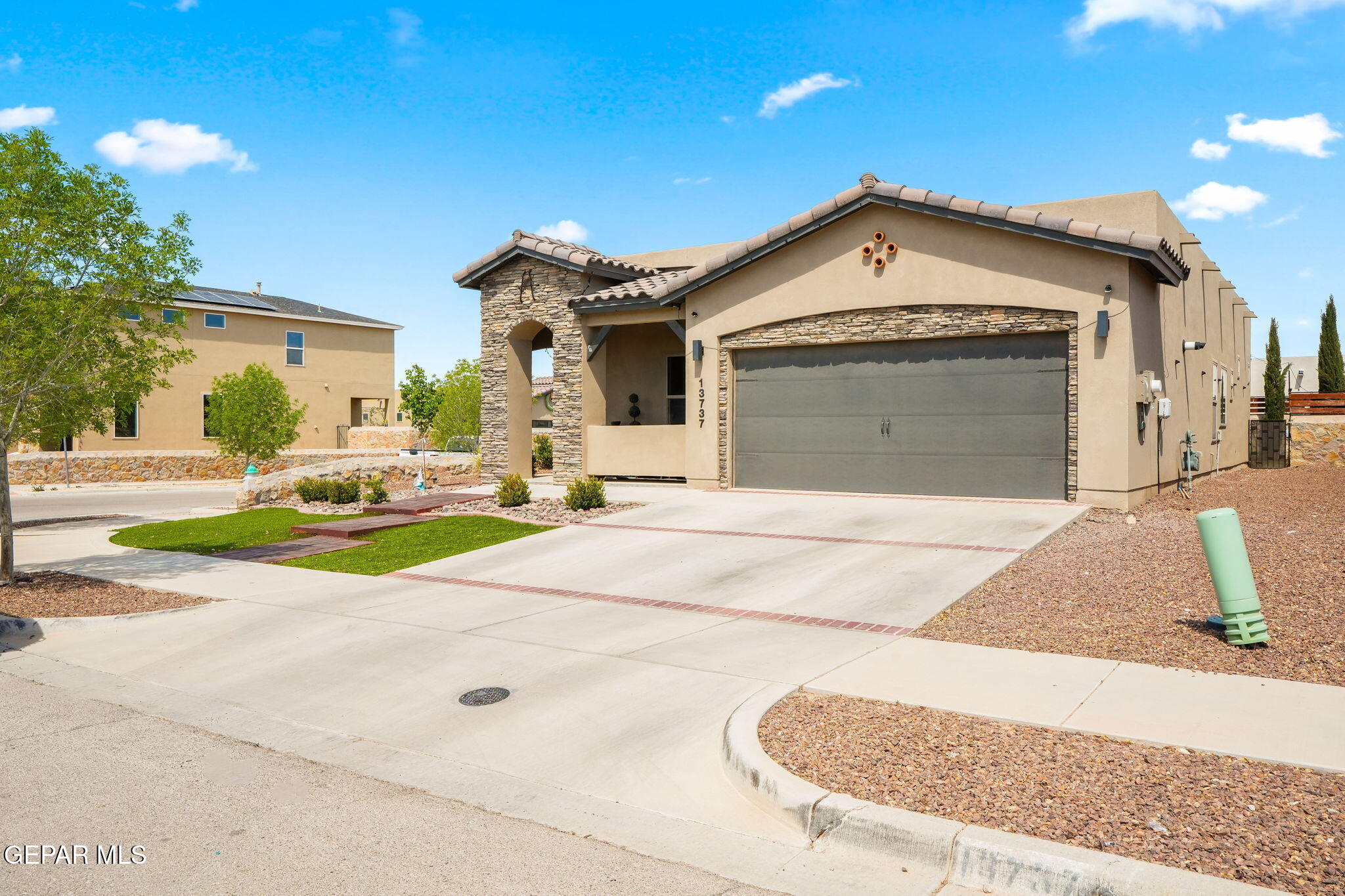 13737 Garforth Avenue El Paso, TX 79928 - Photo 2 of 34 a view of a house with a outdoor space
