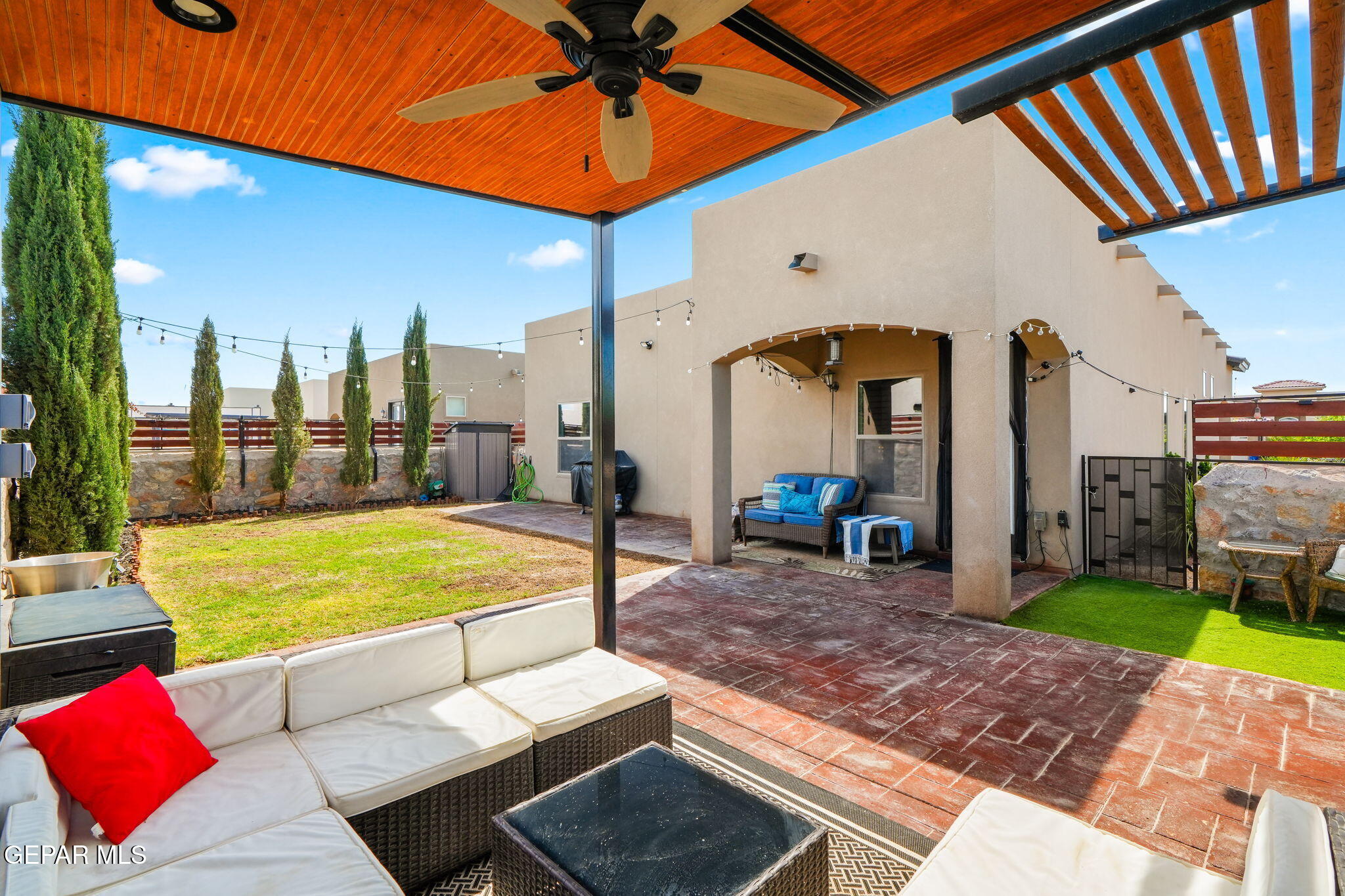 13737 Garforth Avenue El Paso, TX 79928 - Photo 32 of 34 a view of swimming pool with a lounge chair in front of house