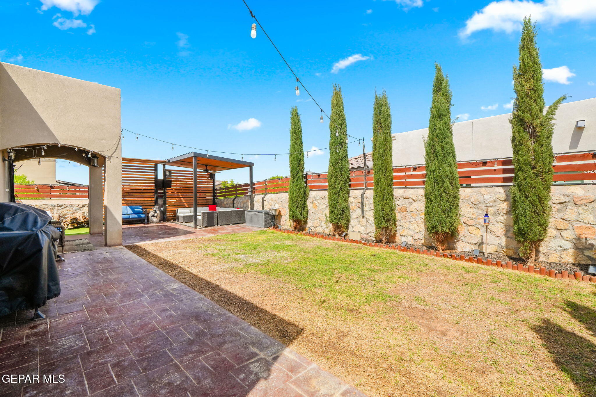 13737 Garforth Avenue El Paso, TX 79928 - Photo 34 of 34 a swimming pool with outdoor seating and yard