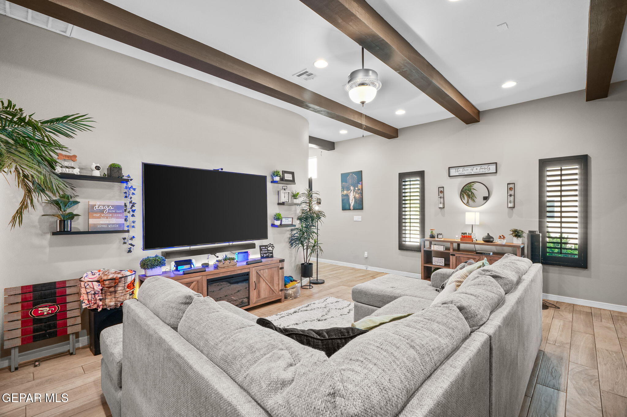 13737 Garforth Avenue El Paso, TX 79928 - Photo 8 of 34 a living room with furniture and a flat screen tv