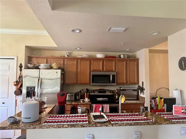 $8,000 | 9723 Acqua Court, Unit 323, Naples, FL 34113