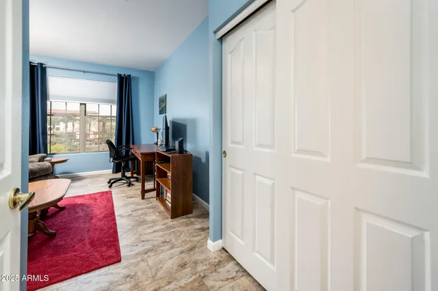 a bathroom with a sink a toilet and shower curtain