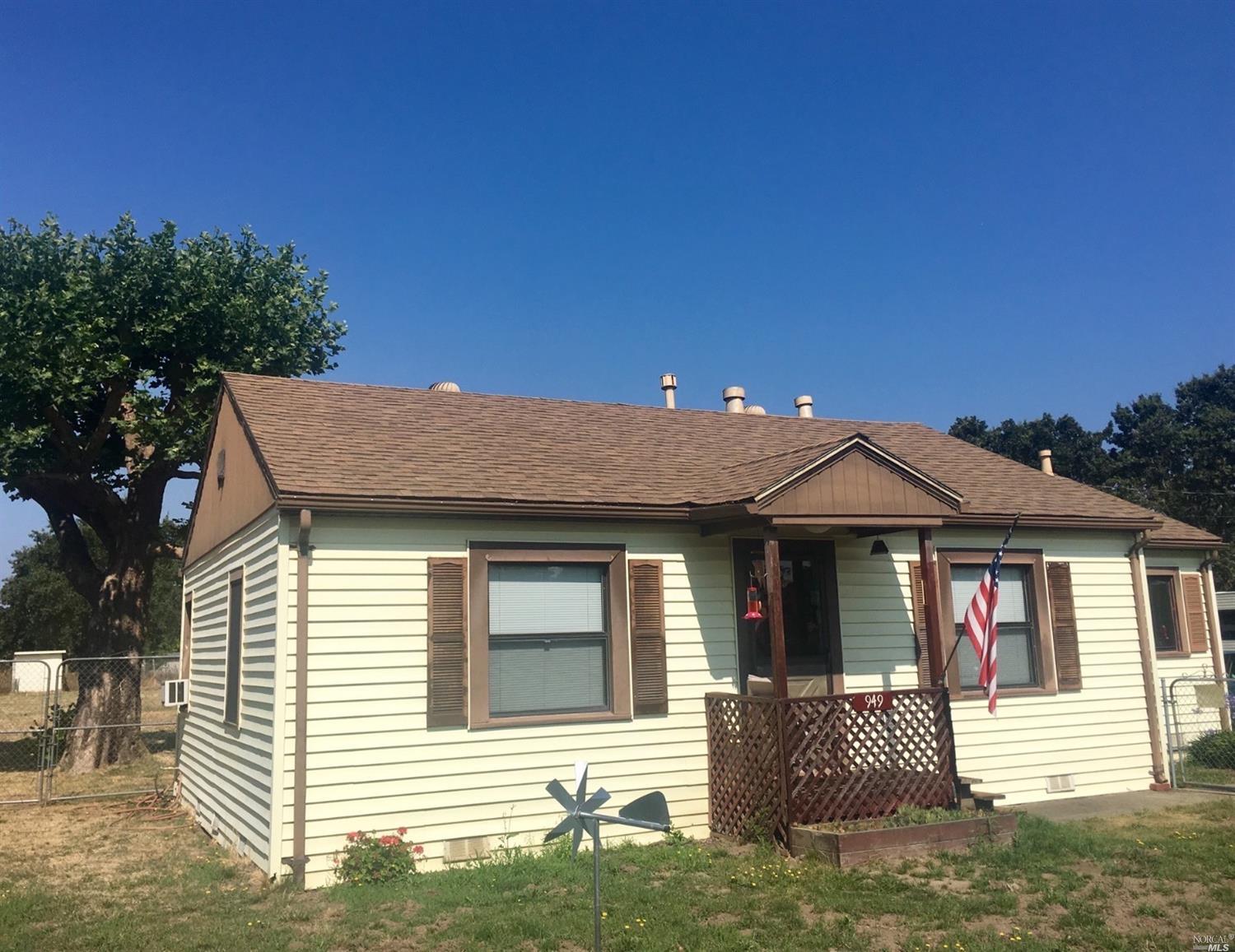 949 South Wright Road Santa Rosa, CA 95407 - Photo 1 of 1 a front view of a house with a yard