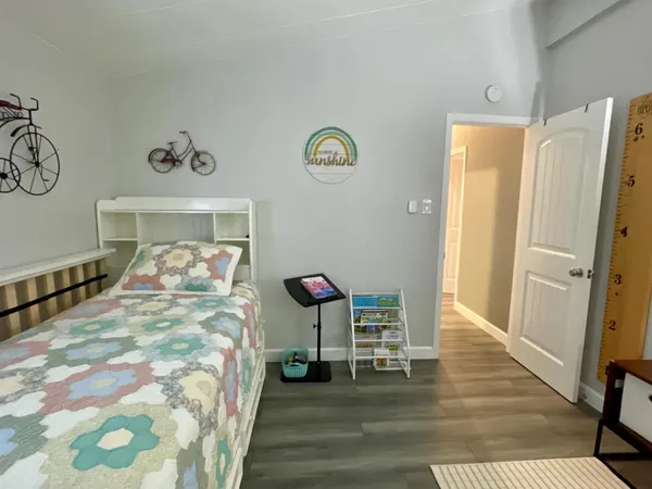 a bed room with a bed and a table