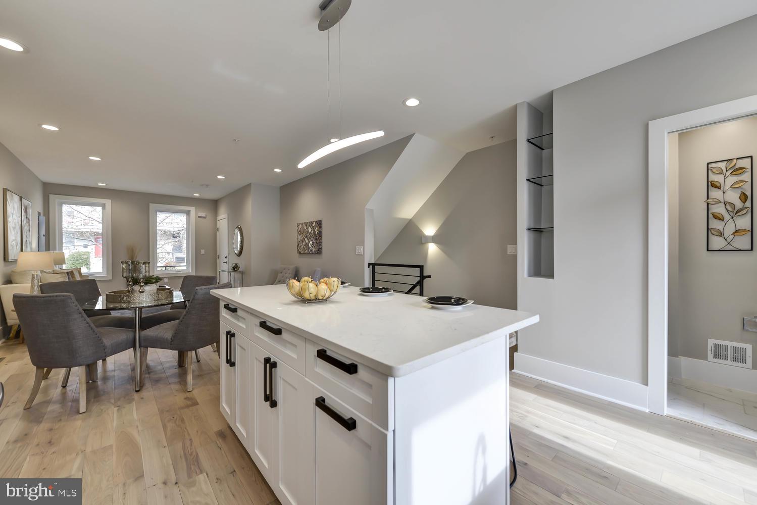 113 U Street Northeast, Unit A Washington, DC 20002 - Photo 14 of 32 View to powder room and living areas