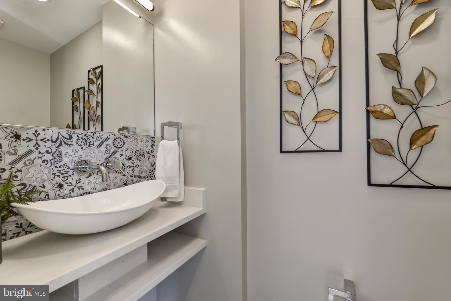 113 U Street Northeast, Unit A Washington, DC 20002 - Photo 15 of 32 Powder room with custom tile work