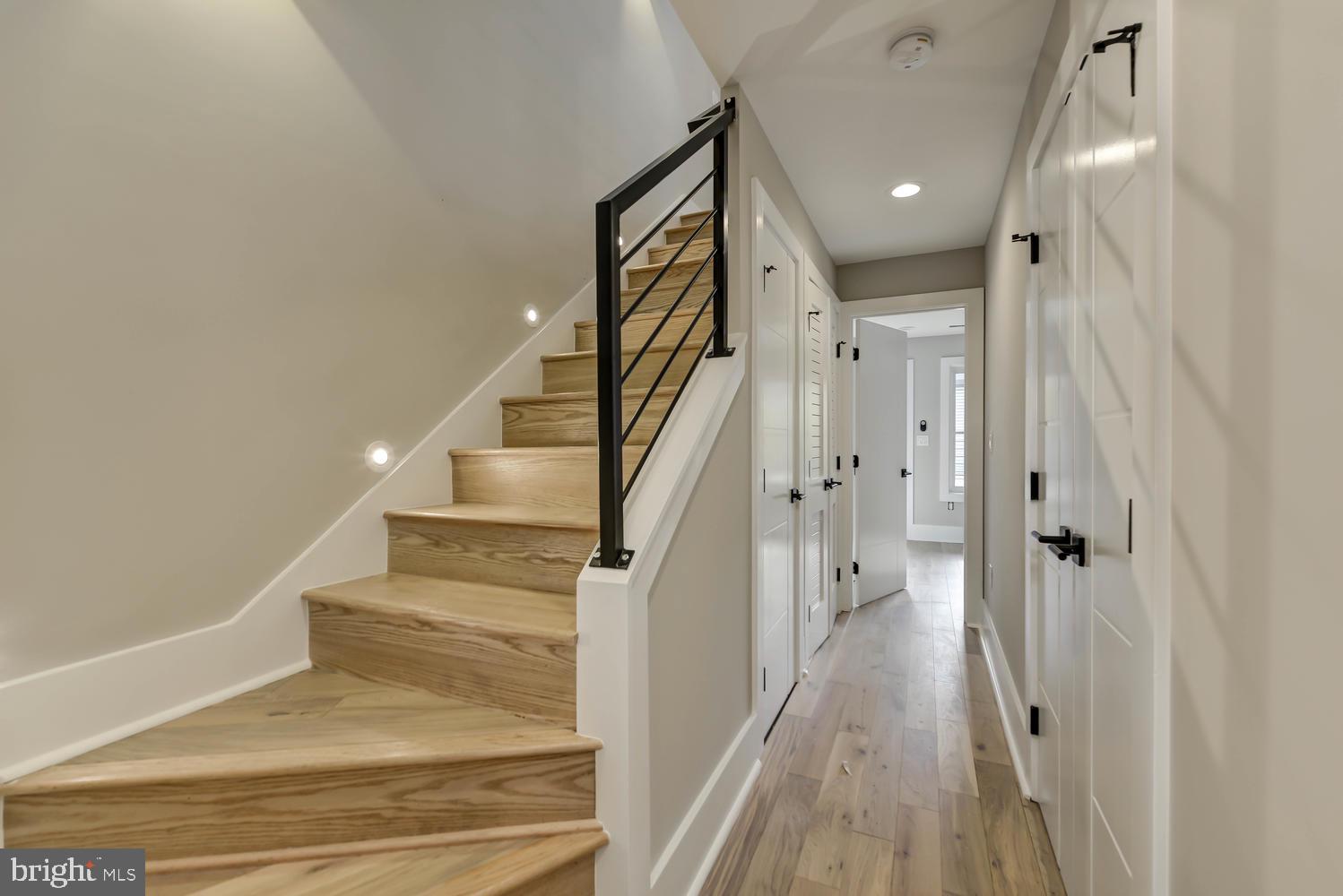 113 U Street Northeast, Unit A Washington, DC 20002 - Photo 16 of 32 Stairway to lower level w/ lighting