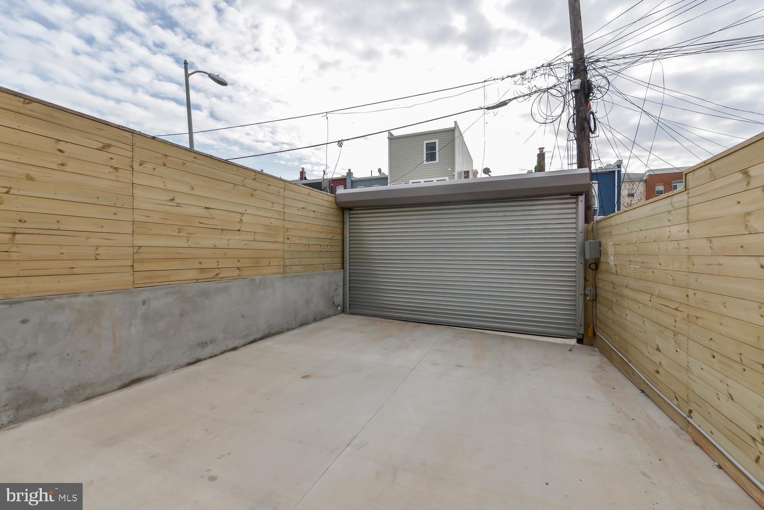 113 U Street Northeast, Unit A Washington, DC 20002 - Photo 29 of 32 Commercial grade roll top garage