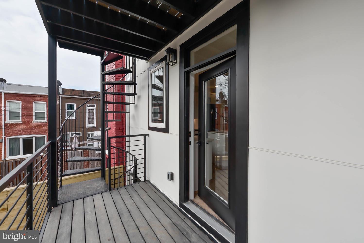 113 U Street Northeast, Unit A Washington, DC 20002 - Photo 31 of 32 Covered balcony off of the kitchen
