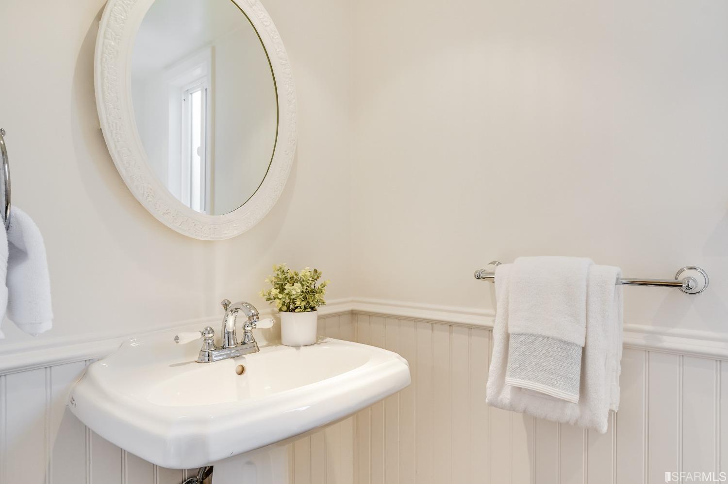 1838 Whitecliff Way San Mateo, CA 94402 - Photo 11 of 56 a bathroom with a sink and a mirror