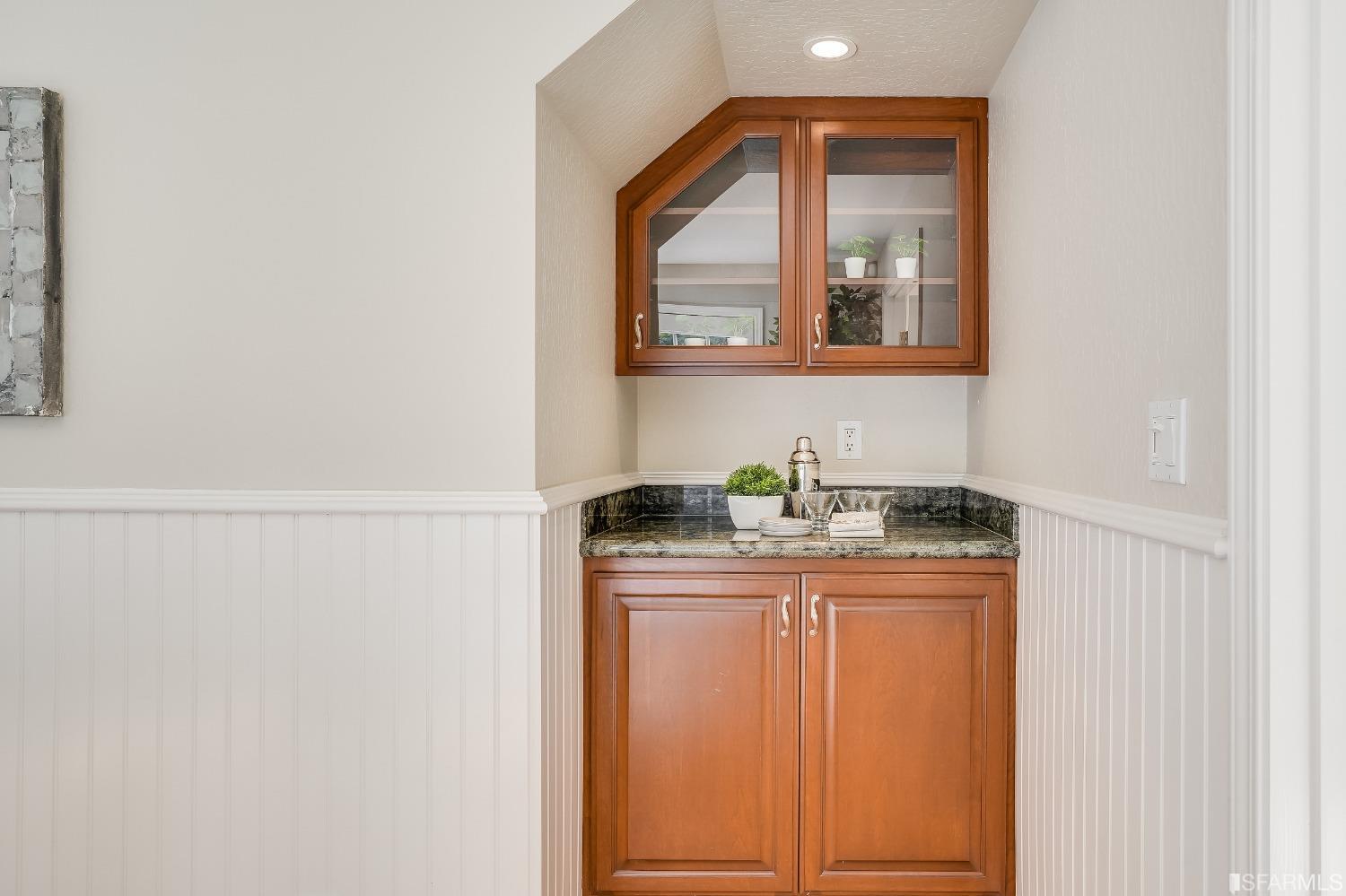 1838 Whitecliff Way San Mateo, CA 94402 - Photo 14 of 56 a bathroom with a granite countertop sink and a mirror
