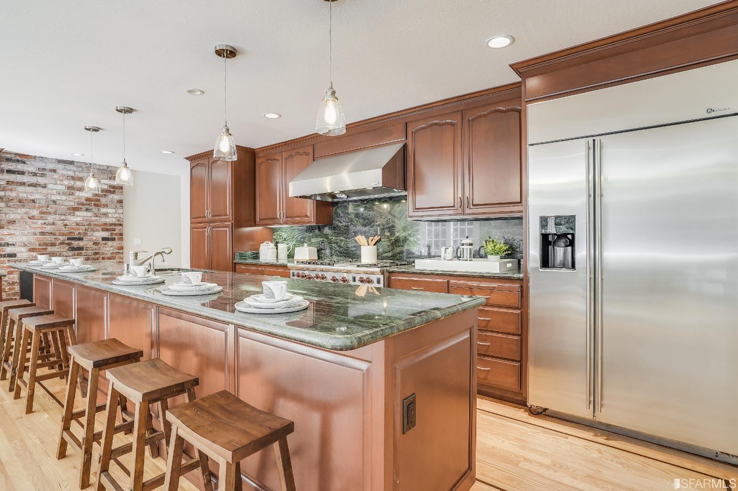 1838 Whitecliff Way San Mateo, CA 94402 - Photo 19 of 56 a kitchen with stainless steel appliances granite countertop a refrigerator a sink and a stove