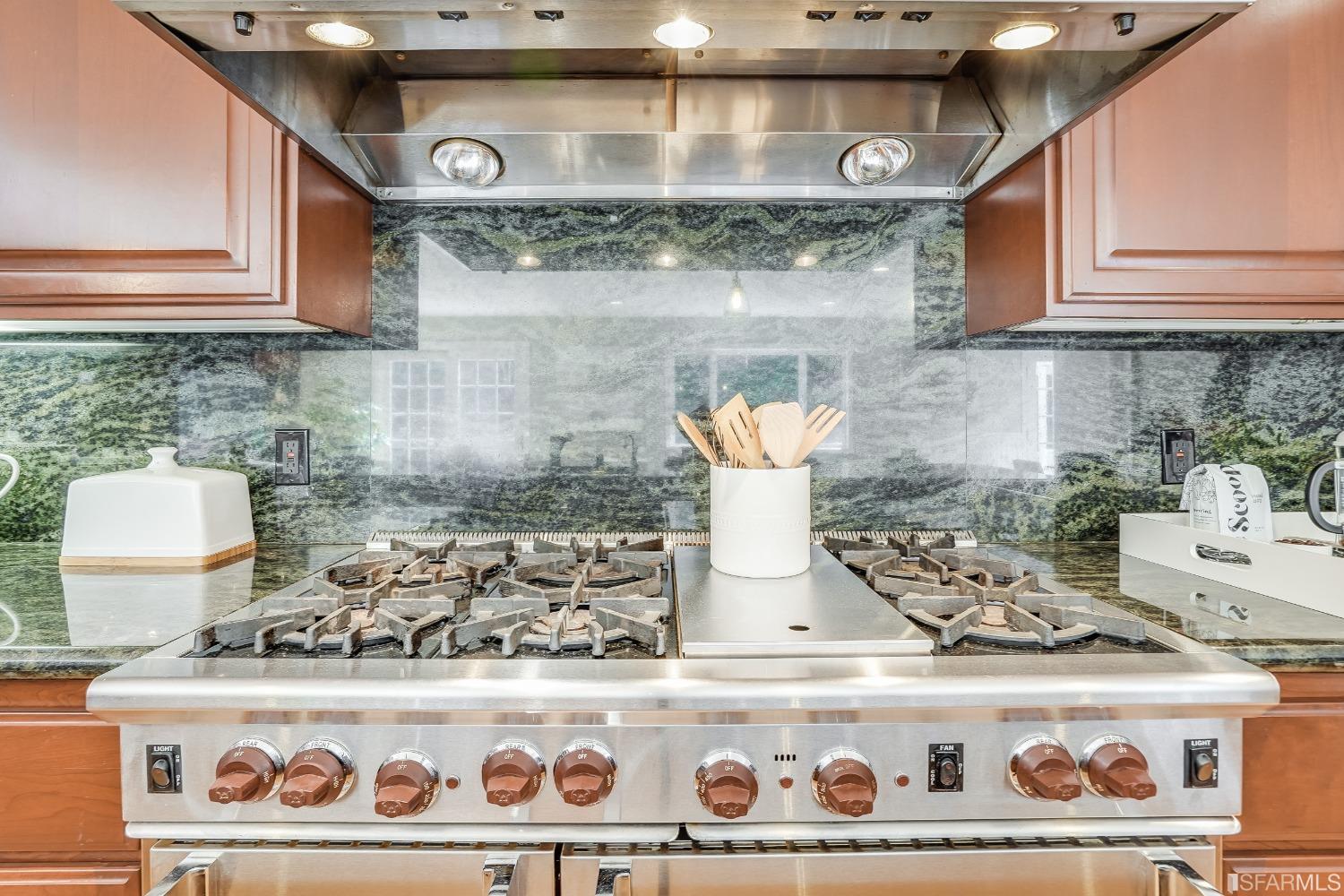 1838 Whitecliff Way San Mateo, CA 94402 - Photo 21 of 56 a stove top oven sitting inside of a kitchen