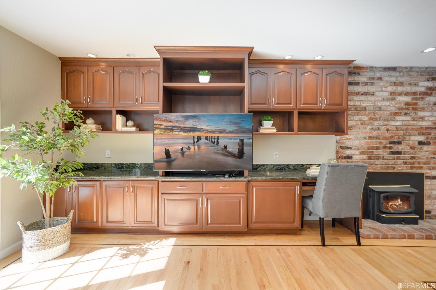 1838 Whitecliff Way San Mateo, CA 94402 - Photo 23 of 56 a kitchen with stainless steel appliances granite countertop a stove a sink and a microwave
